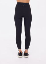THE UPSIDE women's black recycled rib Rhythm 25inch Legging has a mid-rise fit and features cream and mocha binds along side seams. Made for yoga & pilates.