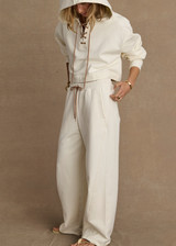 THE UPSIDE women's cream organic cotton terry Arkana Estelle Pant is designed for a relaxed fit with a barrel shaped leg and features an elasticated waistband and side pockets. Made for lifestyle.