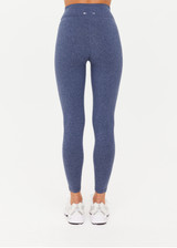 THE UPSIDE women's blue Bowery 25Inch Legging features ultraflex recycled fabrication with a mid-rise and cream embroidered stripes down side seams. Made for yoga and pilates.