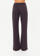 THE UPSIDE women's black Petra Flare Pant features soft, flared fabrication with grey splits at hem, side seam pockets and an elasticated waist. Made for lifestyle.