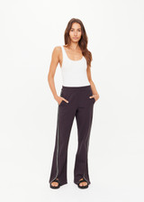 THE UPSIDE women's black Petra Flare Pant features soft, flared fabrication with grey splits at hem, side seam pockets and an elasticated waist. Made for lifestyle.