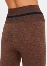 THE UPSIDE women's brown seamless Marle Seamless 25Inch Midi Legging offers a mid-rise with a black stripe at waistband. Made for yoga & pilates.