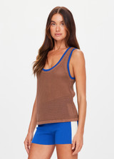 THE UPSIDE women's brown organic cotton Avalon Wales Knit Tank Top is a basketball style tank with a ribbed neckline and armholes in contrast blue, with open knit construction. Made for lifestyle.