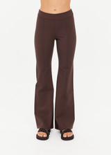 THE UPSIDE women's brown Joyela Flare Pant features a mid rise, full length flare pant with heavy ponte fabrication and a soft elastic waistband. Made for lifestyle.