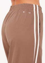 THE UPSIDE women's brown Juliet Pant features a lightweight,  low-rise design with an elasticated waist band, side seam pockets and cream contrast binds. Made for everyday wear.