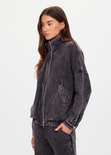 THE UPSIDE women's washed black Cosmic Carmen Moto Jacket is designed for a relaxed fit and features welt pockets and a soft elasticated hem. Perfect everyday outerwear piece.