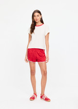 THE UPSIDE women's cream hemp cotton Dusty Ray 70'S Tee is true to size and features a contrast red neckline. Made for everyday wear.