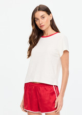 THE UPSIDE women's cream hemp cotton Dusty Ray 70'S Tee is true to size and features a contrast red neckline. Made for everyday wear.