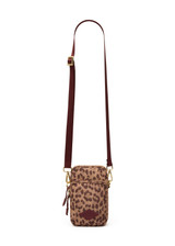 THE UPSIDE women’s leopard recycled Javan Lilo Crossbody Bag has an adjustable and removable strap with multi pockets and metal zippers. Made for lifestyle.