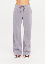 THE UPSIDE women’s sparkle grey Galaxia Marnie Wide Leg Pant is high rise with side pockets, an elasticated waistband and a maroon drawcord. Made for lifestyle.