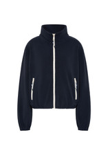 THE UPSIDE women’s navy recycled Sol Fleece Jacket offers a relaxed fit and features a zip through front, front zip pockets, elasticated waist and cuffs and contrast paracord zip pullers. Made for lifestyle.