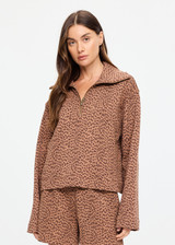 THE UPSIDE women’s leopard organic cotton Javan Jones Quarter Zip Sweat is designed for a regular fit and features dropped shoulders and a quarter zip neckline. Made for lifestyle.