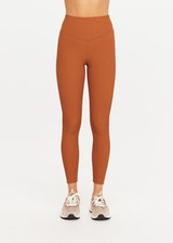 THE UPSIDE women’s brown recycled jacquard Mariana 25inch High Midi Legging offers a soft and supportive fit and features a high rise waist and V panel waistband. Made for yoga and pilates.