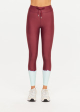 THE UPSIDE women’s tie dye recycled Rio 25inch Midi Legging offers a mid rise, drawcord waist and is printed in supersoft and breathable fabric. Made for yoga and pilates.