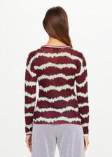 THE UPSIDE women’s tie dye 100% linen Rio Eli Long Sleeve Knit is a regular fit crew neck top and features a lightweight knit fabrication, button front opening and ribbed neckline. Made for lifestyle.