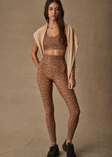 THE UPSIDE women’s leopard recycled peached Javan 28inch High Rise Legging is designed for a soft and supportive fit and features a high rise waist. Made for yoga and pilates.