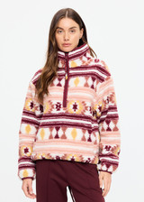 THE UPSIDE women’s recycled Harlow Fleece Pullover offers a relaxed fit and features a quarter zip front, zip pockets, elasticated waist and cuffs and all over jacquard print. Made for lifestyle.