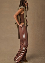 THE UPSIDE women's brown Marnie Silk Wide Leg Pant is true to size with high-rise fit, elasticated waistband, and cream side seam bindings. Made for lifestyle.