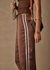 THE UPSIDE women's brown Marnie Silk Wide Leg Pant is true to size with high-rise fit, elasticated waistband, and cream side seam bindings. Made for lifestyle.