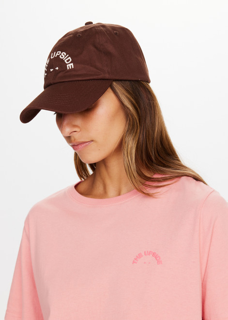 THE UPSIDE Soft Cap in Chocolate Brown is an organic cotton soft retro fit cap with an adjustable Velcro strap and embroidered with our horseshoe logo at front.
