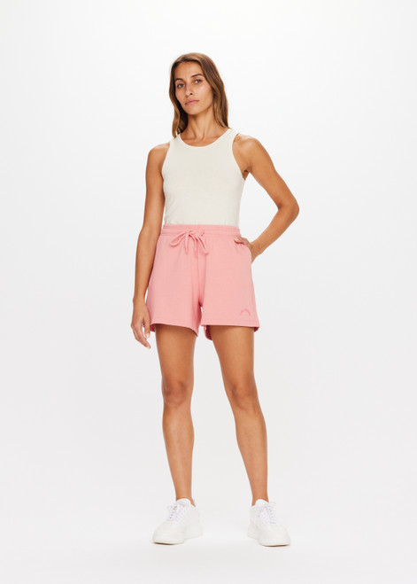 THE UPSIDE Summit Roller Short in Blush Pink is a sustainable organic cotton short with pockets and an elasticated drawstring waistband.