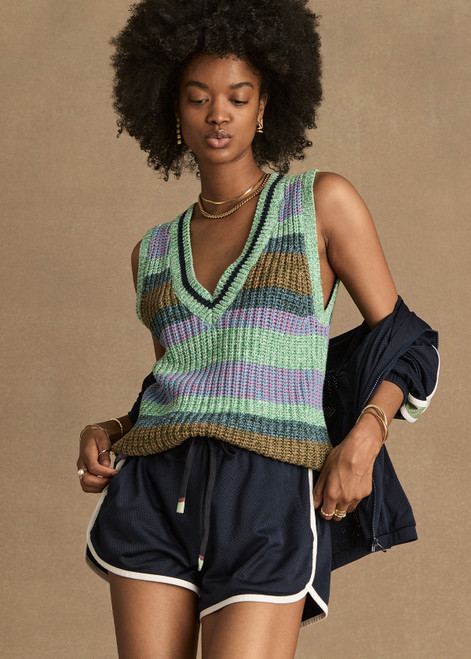 THE UPSIDE women's navy Estadio Callie Short is made with recycled fabric, for a true to size fit. This mini lifestyle short features an elastic waist with side seam pockets.