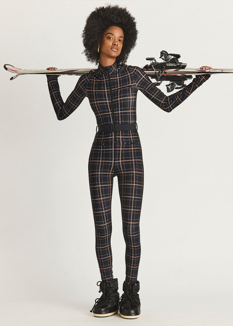 THE UPSIDE women's black check Lumiere Nova Jumpsuit is made in stretch fabric, for a soft fit. This all-in-one ski jumpsuit features thumbholes and a removable belt.