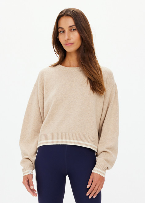 THE UPSIDE women's sand wool cotton blend Xanthe Crew Neck Sweater is designed for a relaxed boxy fit and features contrast cream stripes. Perfect for everyday.
