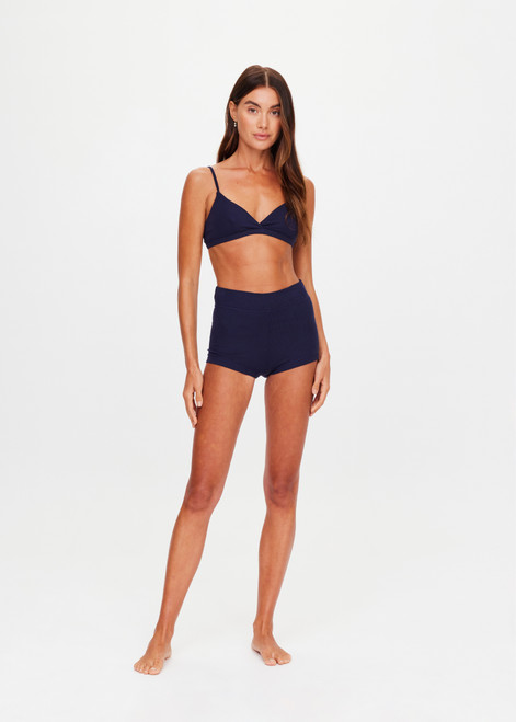 THE UPSIDE women's navy Palais Rib Fox Shortie is designed to be worn under sheer garments and features a folded waistband in a soft ribbed fabrication. Made for lifestyle.