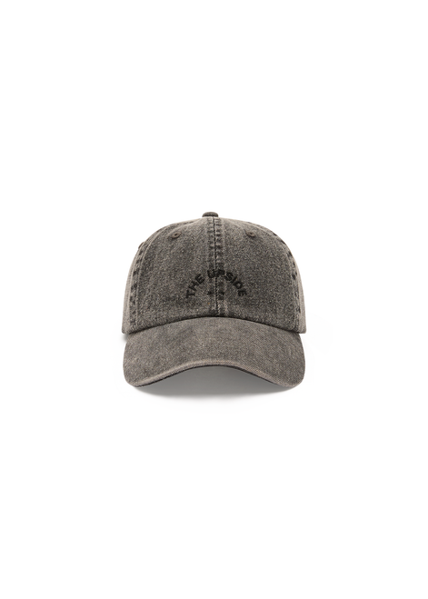 THE UPSIDE women's black Cosmic Washed Denim Soft Cap features a horseshoe logo at front and an adjustable strap at back.
