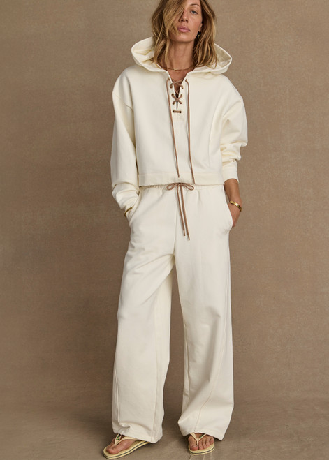 THE UPSIDE women's cream organic cotton terry Arkana Estelle Pant is designed for a relaxed fit with a barrel shaped leg and features an elasticated waistband and side pockets. Made for lifestyle.