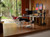 LiberNovo Maxis Electric Ergonomic Chair in Glacier reclined with StepSync Footrest