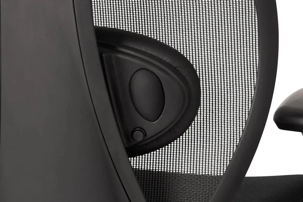Close-up of the tCentric Hybrid air lumbar support behind the mesh backrest.