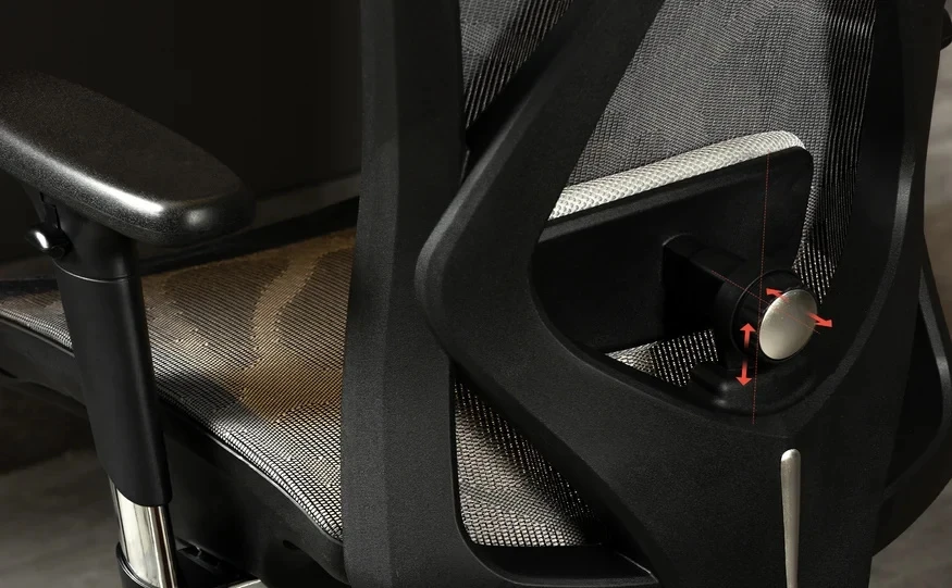 Close-up of the SIHOO M57 lumbar adjustment knob with arrows showing height and depth adjustment