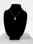 Sterling Silver Om Medallion Charm Necklace