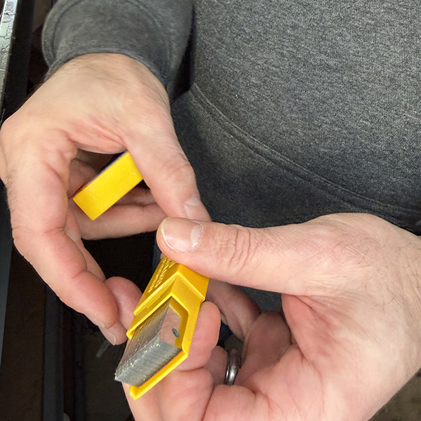 OLFA DC-4 blade disposal container safely snapping used utility knife blade segments