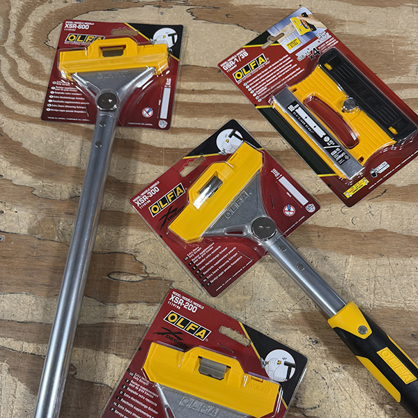 OLFA professional installation tools including scrapers and utility knives used at Performance Auto Spa