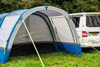 An image of the OLPRO Blue Cocoon Breeze Campervan Awning Extension attached to the Cocoon Breeze that has been fixed to a VW Campervan.