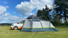 An image of the Hive Breeze® Campervan Awning With Sleeping Pod from OLPRO attached to a Volkswagen Campervan.