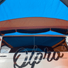 The Uno Breeze v2 Campervan Awning by Olpro photographed from the inside, showing the internal door to the tunnel and its flymesh rolled up neatly. The awning is attached to a volkswagen T5 ,imageset:Orange