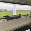 The OLPRO Dehumidifier Bag being used within a caravan pictured by the window of the caravan.