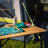 Image of OLPRO Bamboo Folding Camping Table on a white background, fully unfolded.
