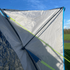 A side view of the protective peak canopy on the OLPRO Cocoon V2 Poled Campervan Awning