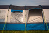 The side of the OLPRO Cocoon V2 Campervan Awning, showing the peak canopy and the side door, closed.