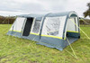 An image of the OLPRO Lime and Grey Cocoon Breeze Campervan Awning Extension attached to the Cocoon Breeze that has been fixed to a VW Campervan.