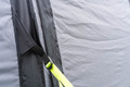 A closeup of the OLPRO Blakedown Breeze 4 Berth Inflatable Tent storm strap that has been tightened.