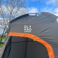 A closeup of the Fibreglass Toilet Tent from OLPRO showing the Logo and the top of the toilet tent.