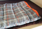 The Hush Pattern Single Sleeping Bag being used within a campervan.
