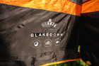 A closeup of the OLPRO Blakedown Breeze 4 Berth Inflatable Tent name and technology logos.