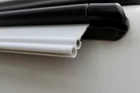 Image of the 4-6mm Awning Driveaway Kit OLPRO by OLPRO fitted to campervan awning 6mm rail from an angle.
